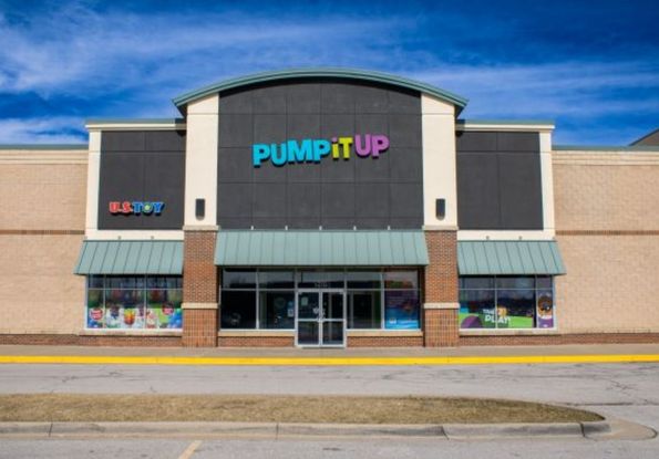 Pump It Up Overland Park Front Entrance with front door that leads to indoor playground for kids birthday parties